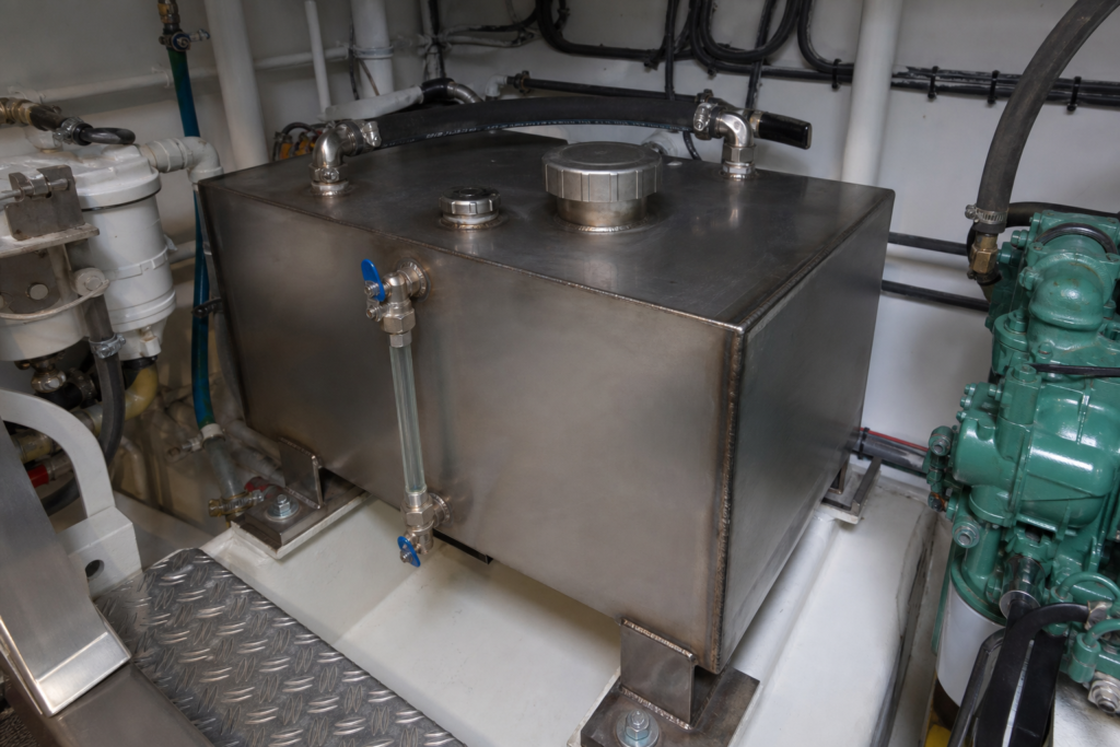 Fabricated marine day tank installed in a boat engine room