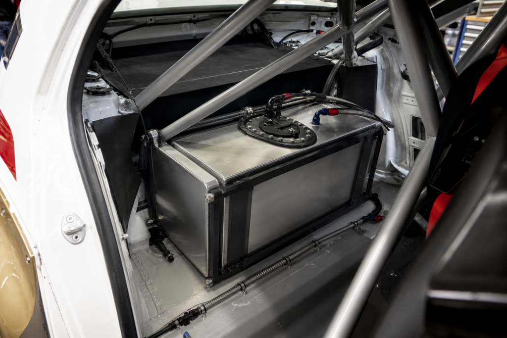 Fabricated competition fuel tank installed in a rally car