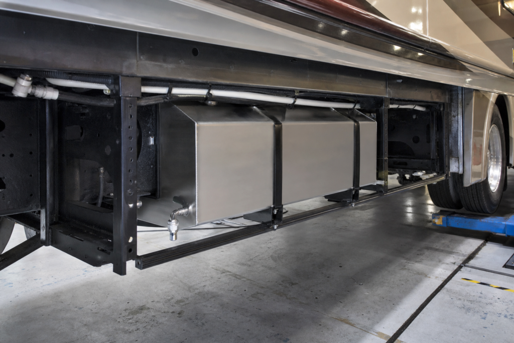 Stainless water tank installed beneath a motorhome